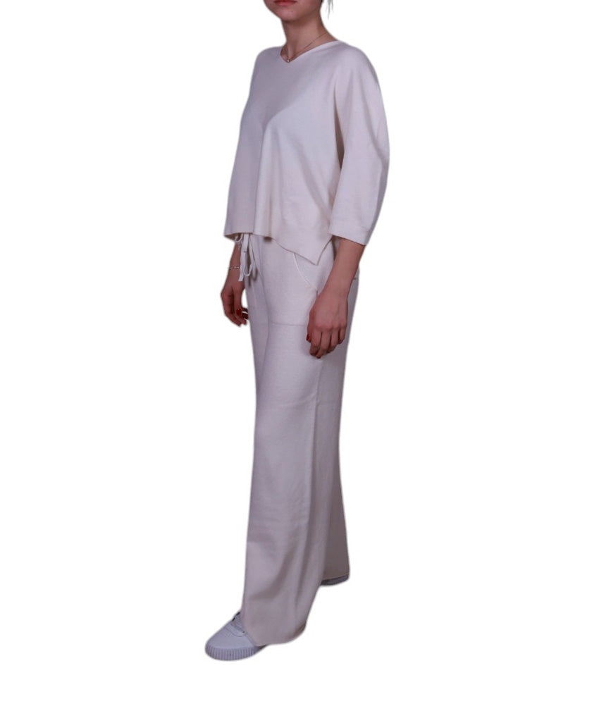 Maglia donna, scollo a V, con manica 3/4 e spacchetti laterali Made in Italy