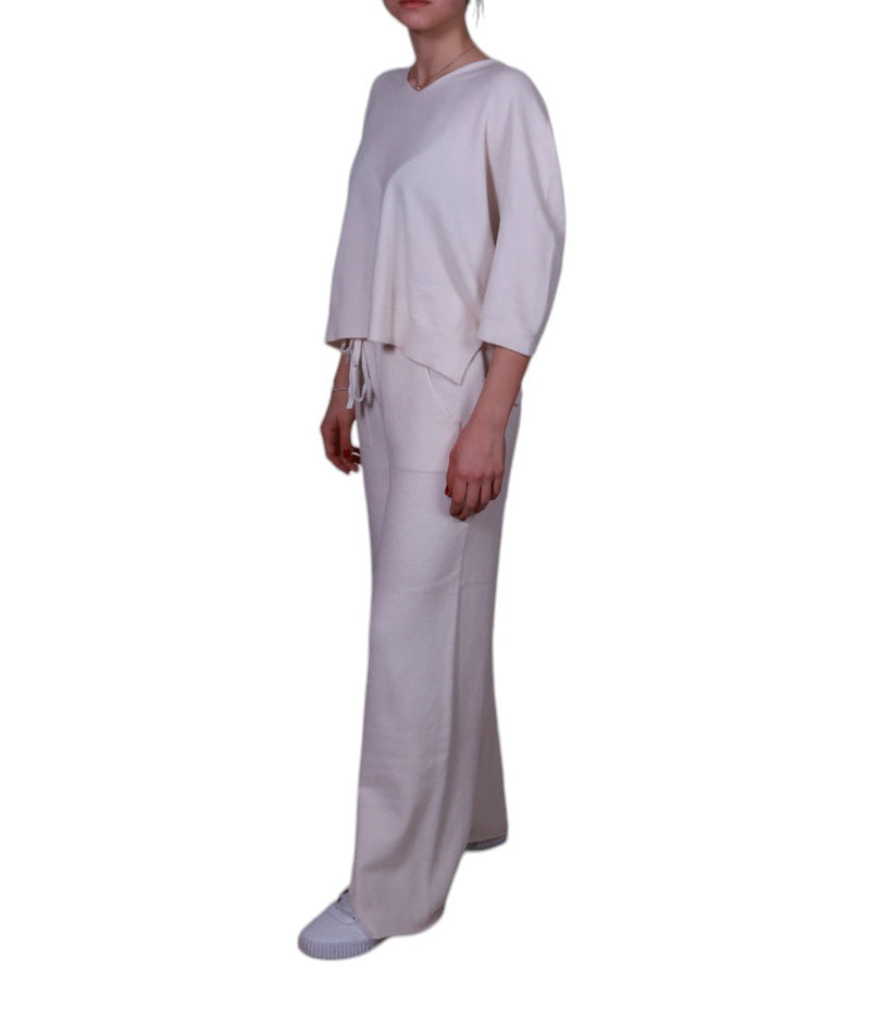 Maglia donna, scollo a V, con manica 3/4 e spacchetti laterali Made in Italy