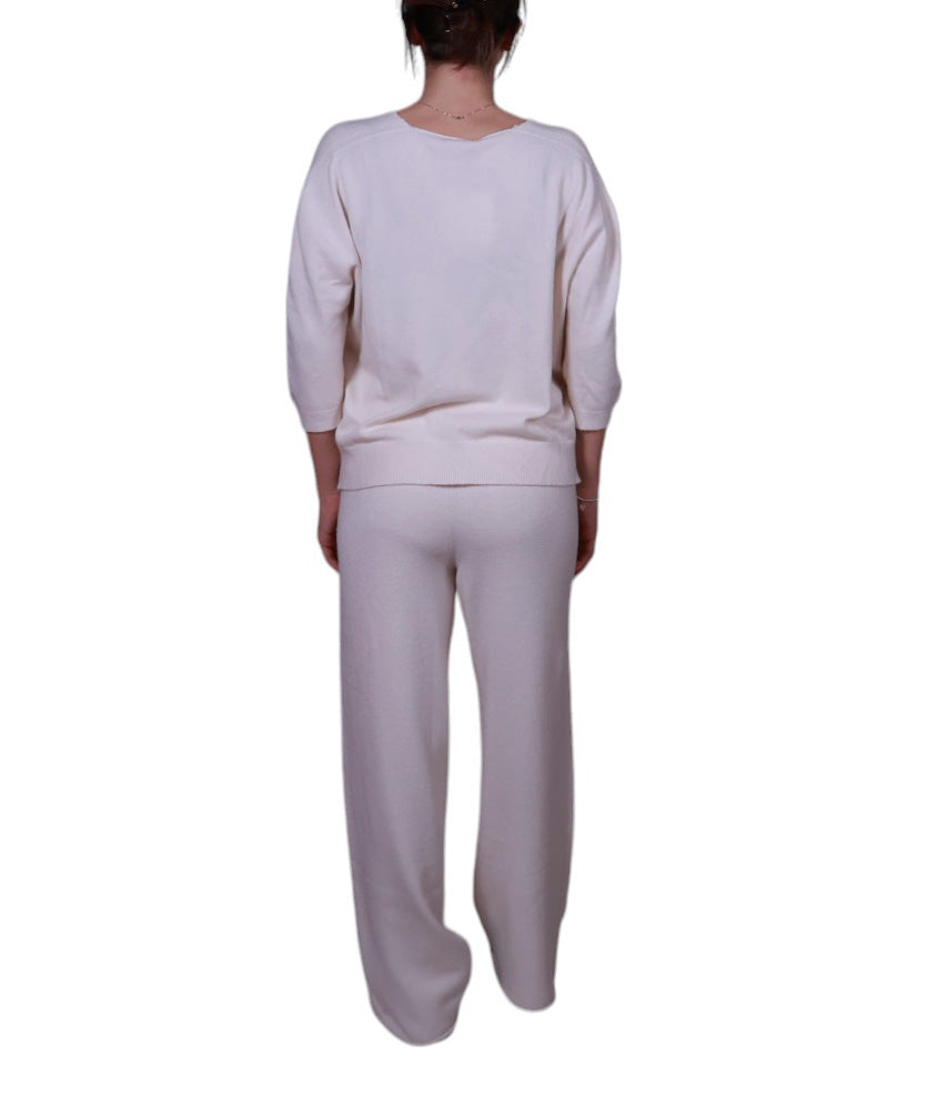 Maglia donna, scollo a V, con manica 3/4 e spacchetti laterali Made in Italy