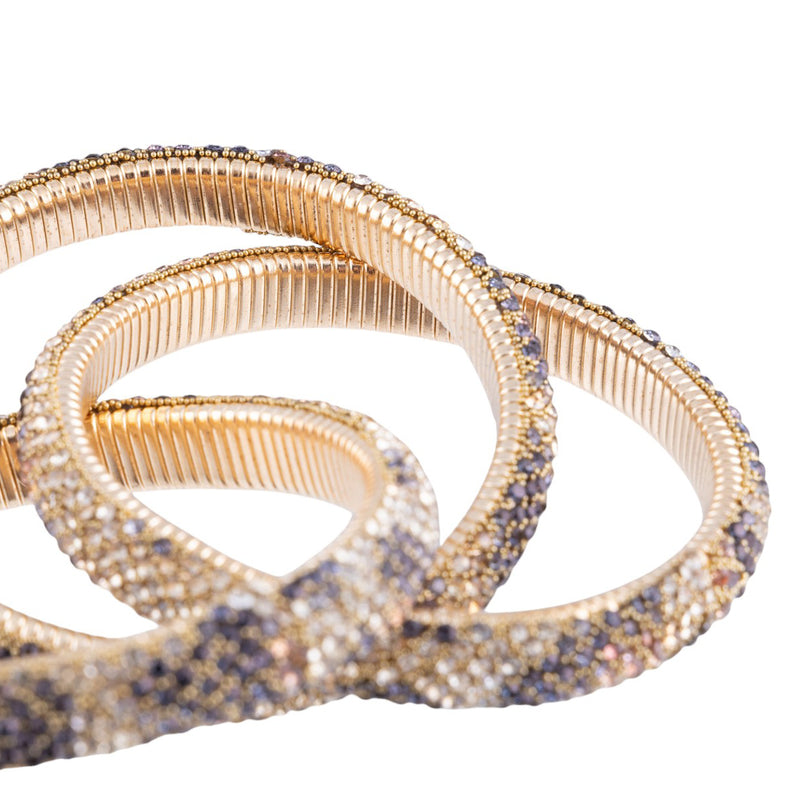 Bracciale semirigido effetto animalier con microstrass e finitura metallica