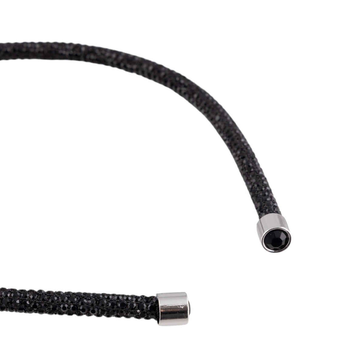 Cerchietto per capelli flessibile con microstrass e terminali metallici lucidi