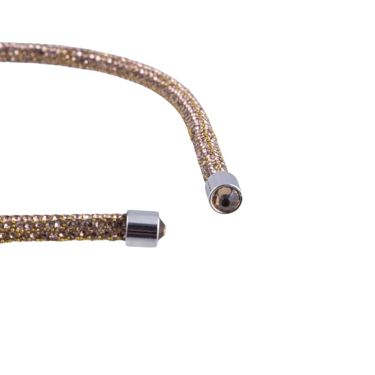 Cerchietto per capelli flessibile con microstrass e terminali metallici lucidi