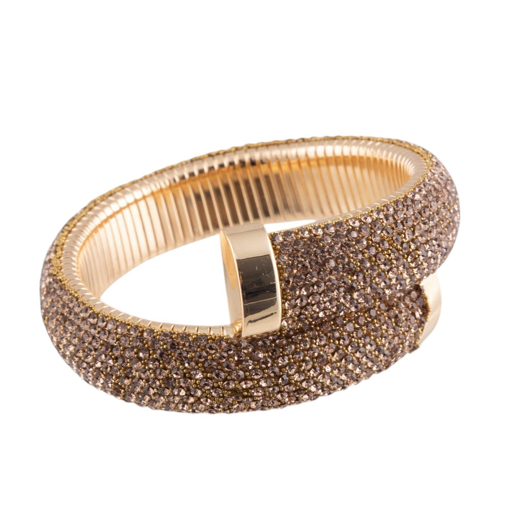 Bracciale a spirale flessibile con strass pavé e finitura metallica lucida