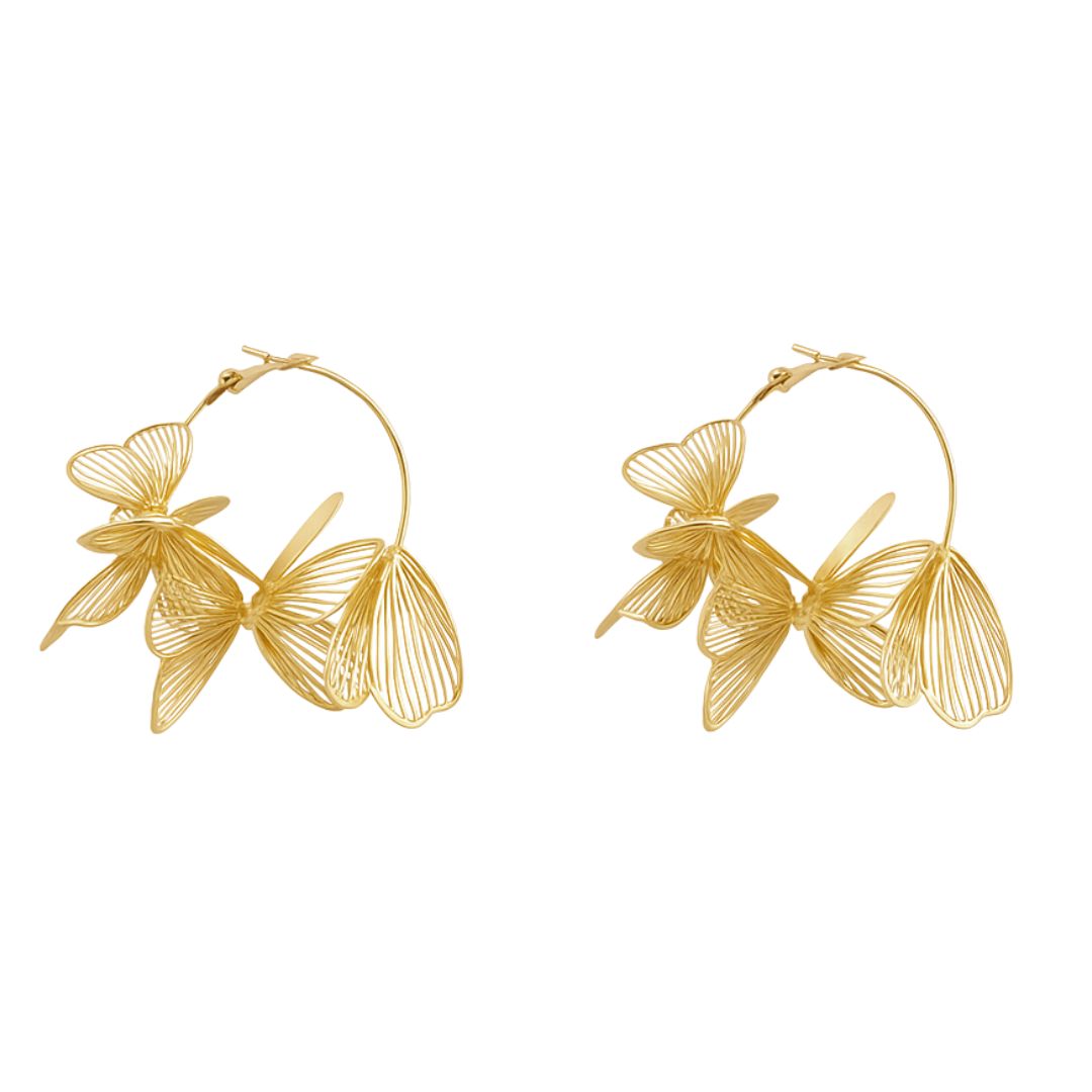 Orecchini pendenti con fiori e farfalle stilizzate in metallo traforato leggero