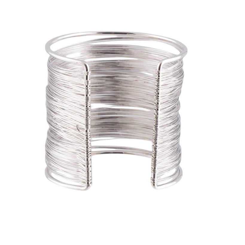 Bracciale rigido multifili in metallo lucido con effetto avvolgente e flessibile