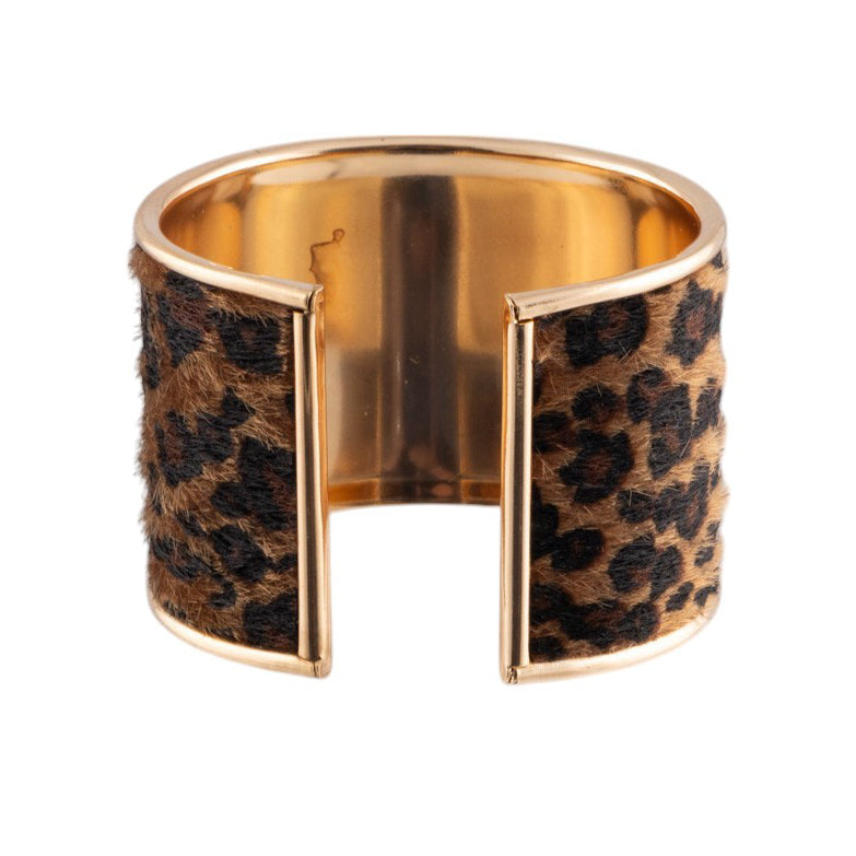 Bracciale rigido animalier effetto cavallino con profilo metallico lucido