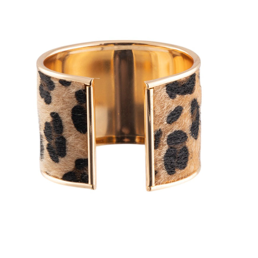 Bracciale rigido animalier effetto cavallino con profilo metallico lucido
