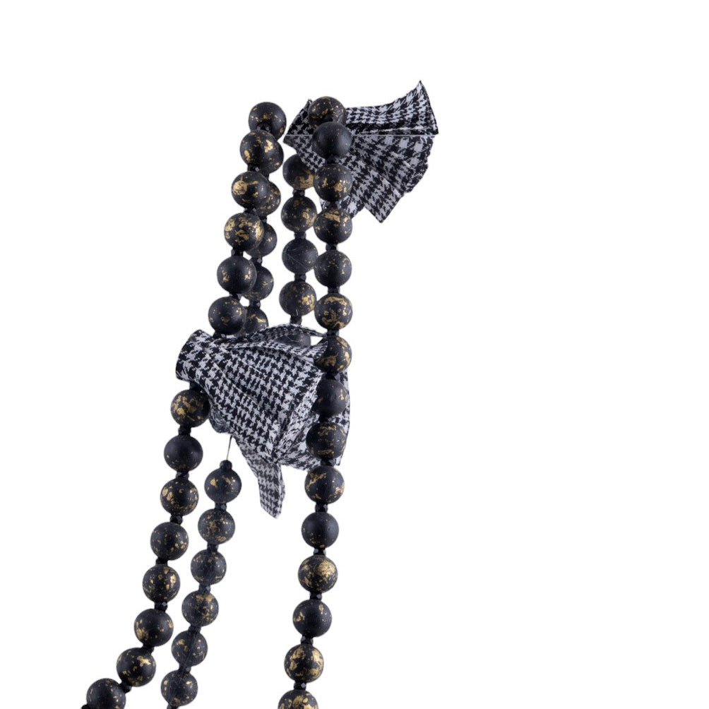 Collana lunga Elegance con fiocchi in tessuto e perle decorative effetto lucido