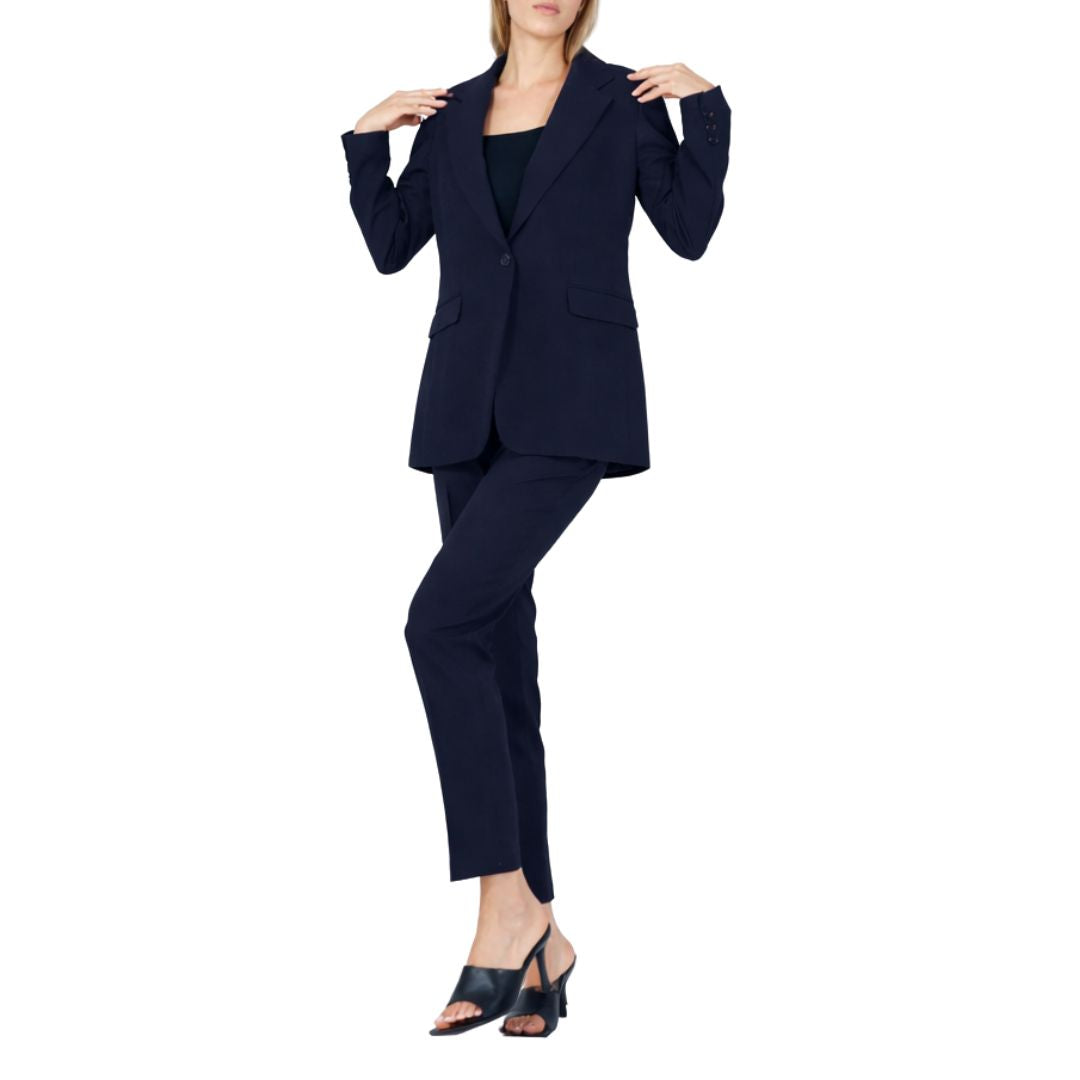 Completo donna giacca monobottone e finte tasche, pantaloni a sigaretta con zip
