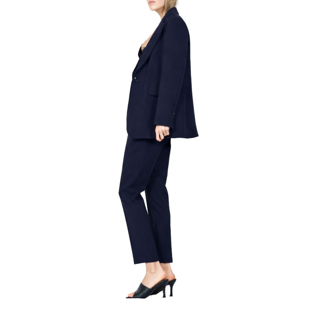 Completo donna giacca monobottone e finte tasche, pantaloni a sigaretta con zip