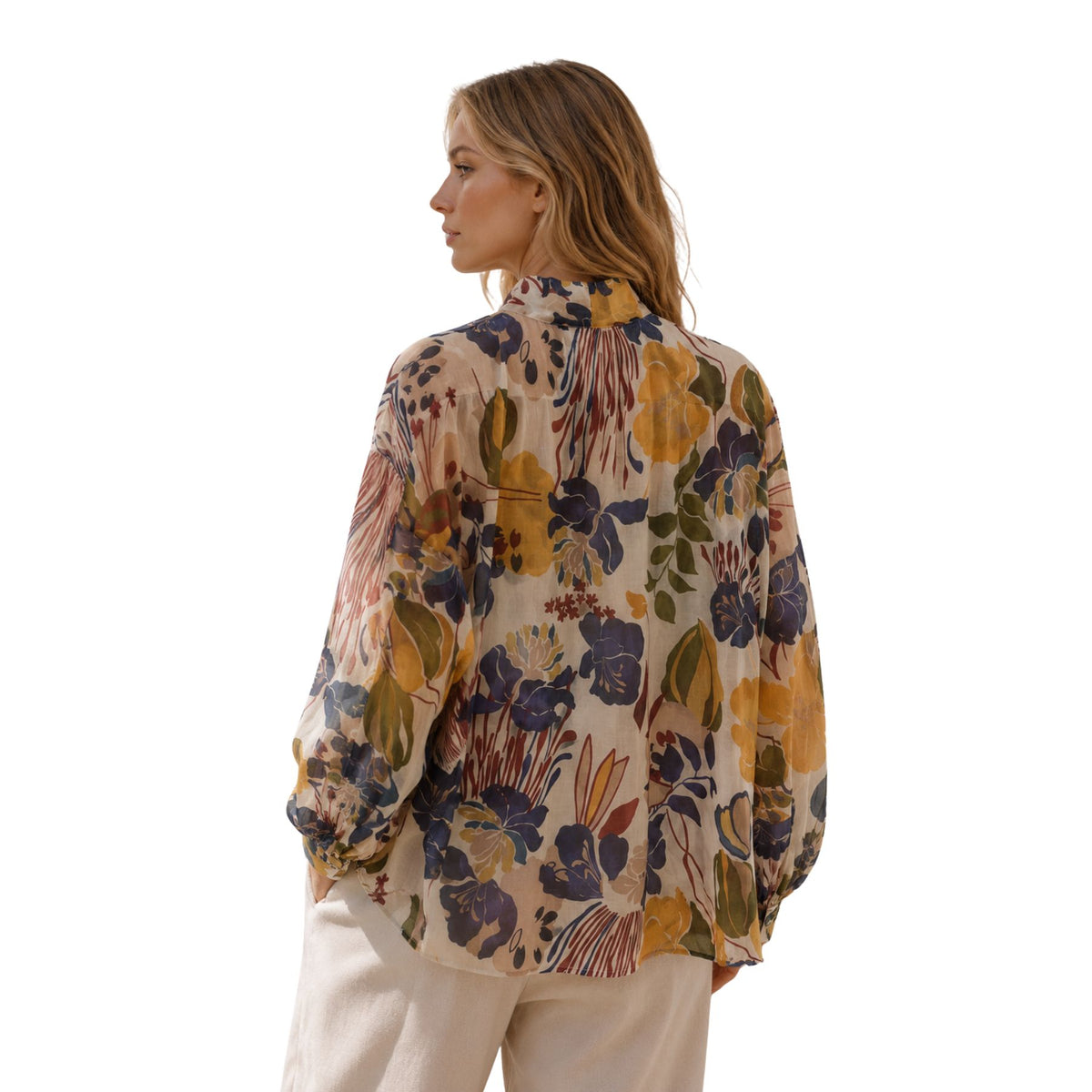 Blusa donna semitrasparente, fiocco al collo e fantasia Made in Italy