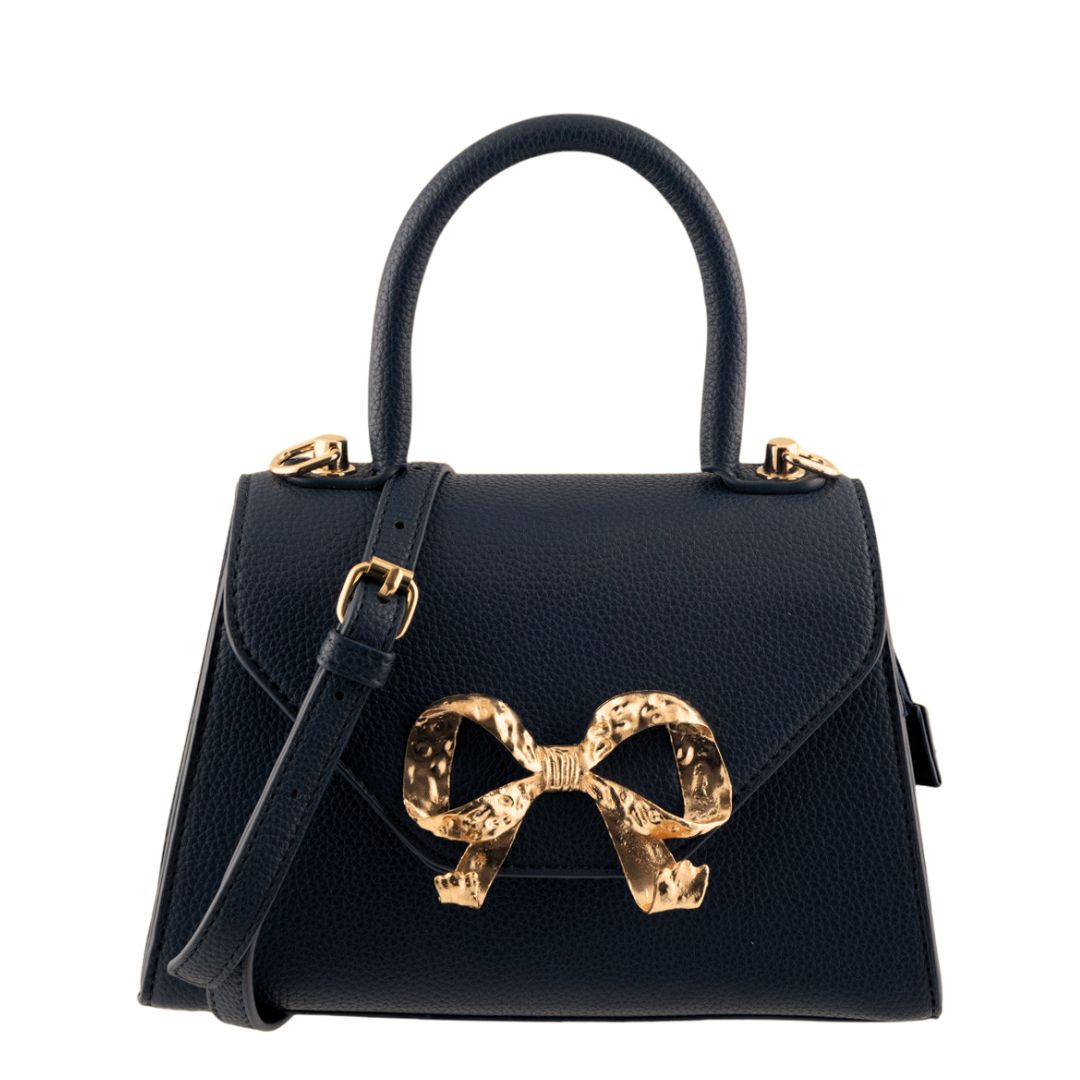 Borsa donna a trapezio in pelle martellata con chiusura frontale a fiocco oro